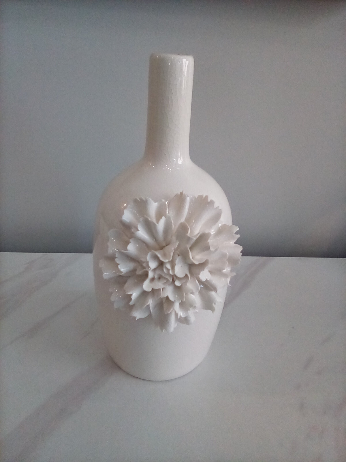 White Ceramic Bottle w/Flower med. 13746B